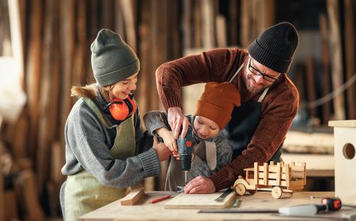 Parents and child doing DIY project