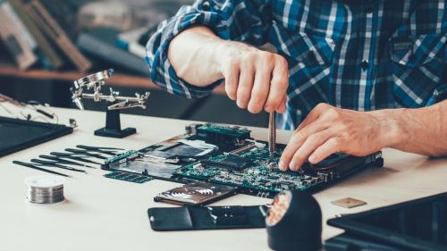 A DIY enthusiast at a workbench